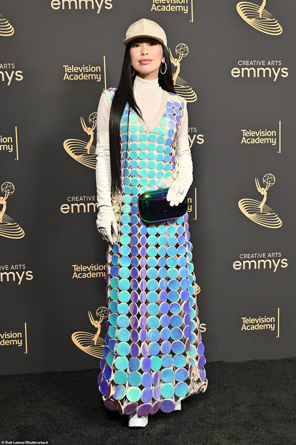 Sizzler: Glamorous reality stars flock to the Microsoft stage, including Kristen Chiu of Bling Empire fame, who opted for a dash of boho chic with a colorful polka-dotted gown over a turtleneck
