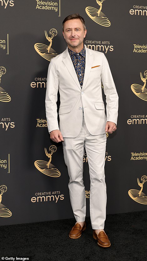 Tickle a funny bone: Nerdist founder Chris Hardwicke strutted his stuff alone in a white suit a few days before Labor Day