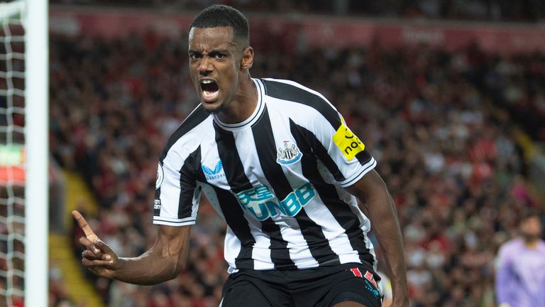 Alexander Isak celebrates scoring on his debut for Newcastle
