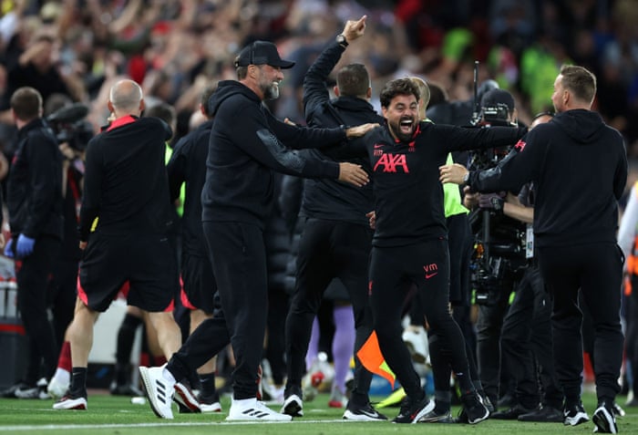 Liverpool coach Jurgen Klopp celebrates his second goal with his back crew.