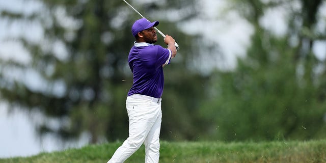 Harold Varner III plays a second shot on the fifth hole during the final round of the BMW Championship at Wilmington Country Club in Wilmington, Delaware, on August 21, 2022.