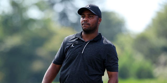 Harold Varner III plays a second shot on the 14th hole during the second round of the BMW Championship at Wilmington Country Club in Wilmington, Delaware, on August 19, 2022.